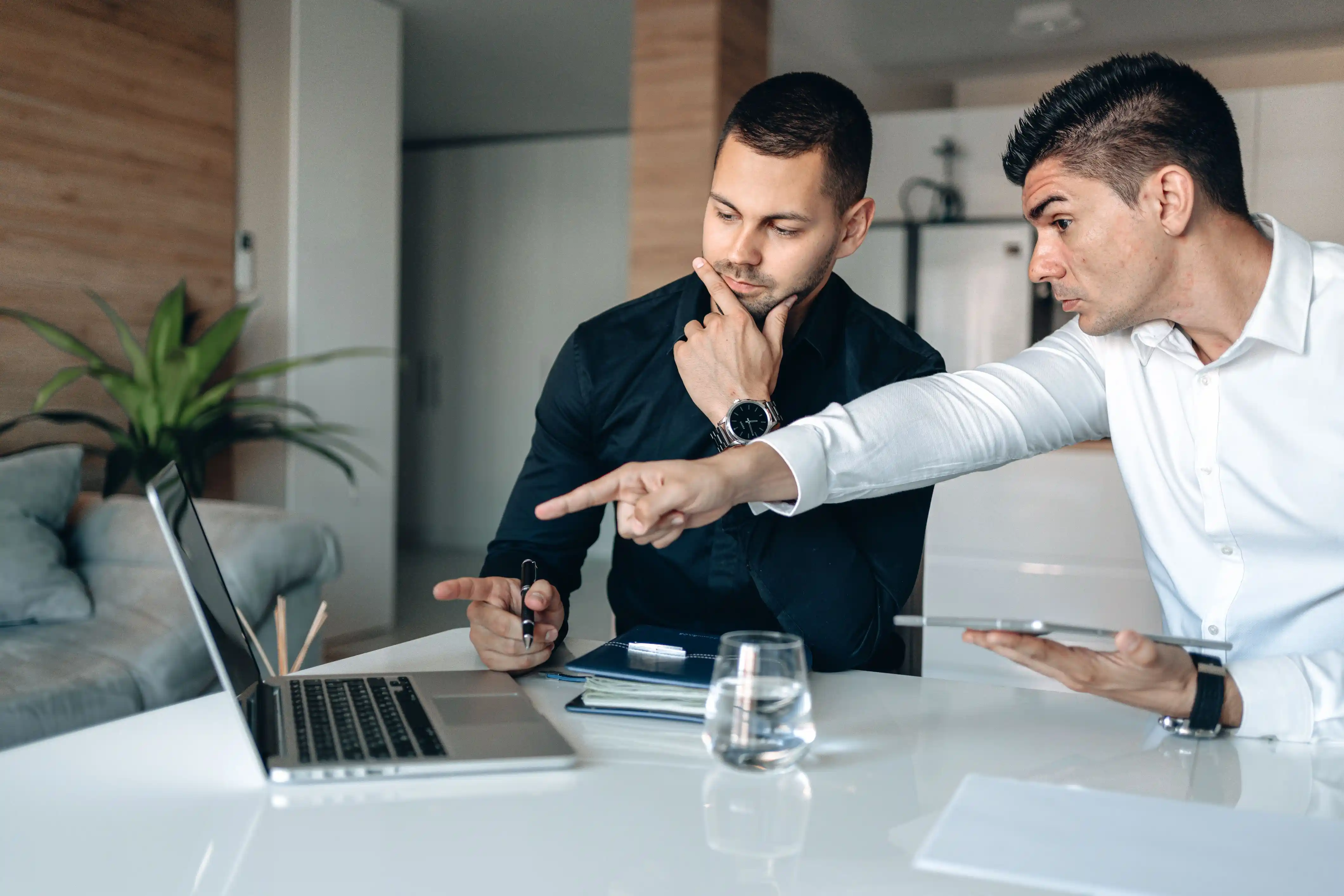 Chief Executive Officer utilizing predictive AI analytics models to guide corporate investment decisions.